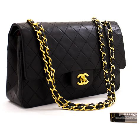 black Chanel bag with chain